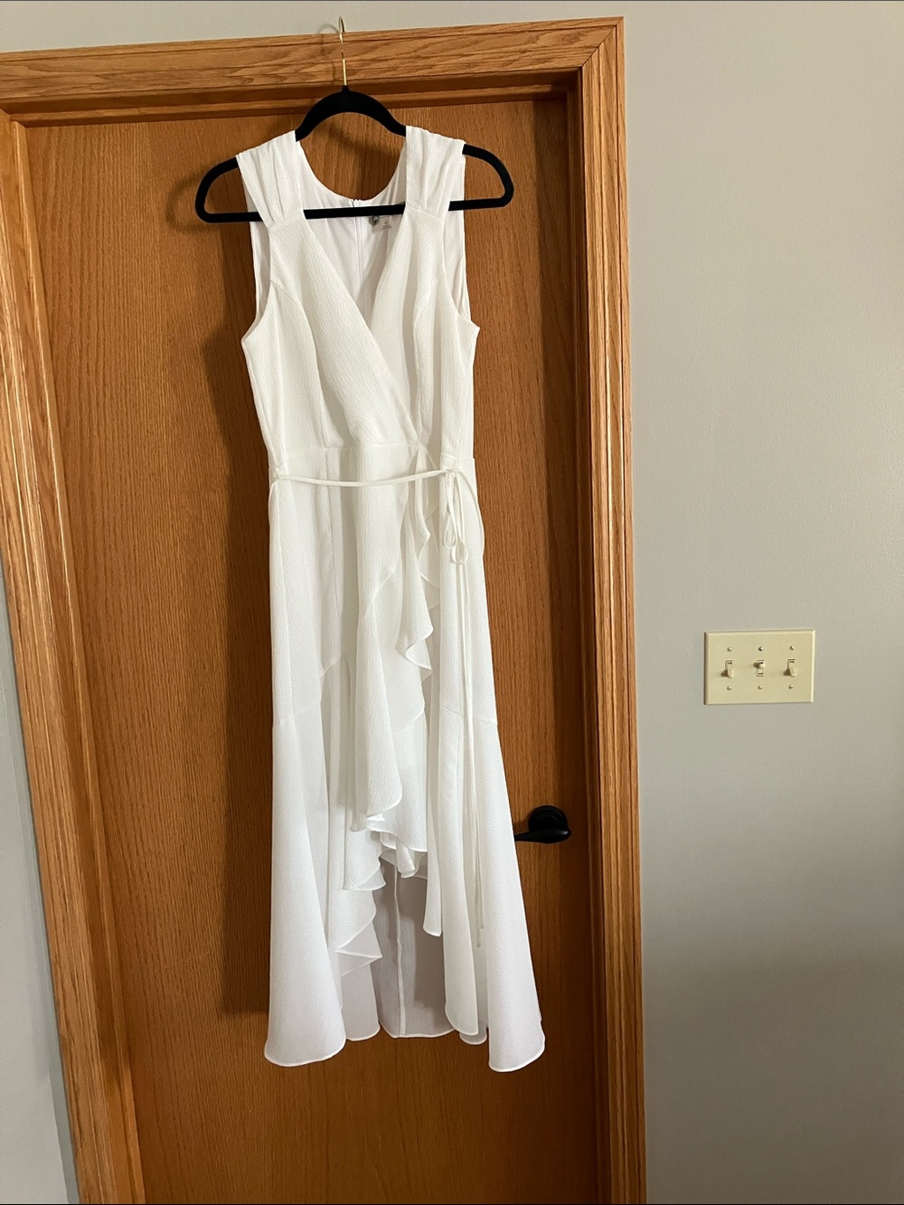 Danny & Nicole White Sleeveless High-Low Wrap Dress with Ruffle Trim